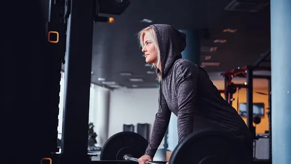 Woman doing stretching and recovery exercises